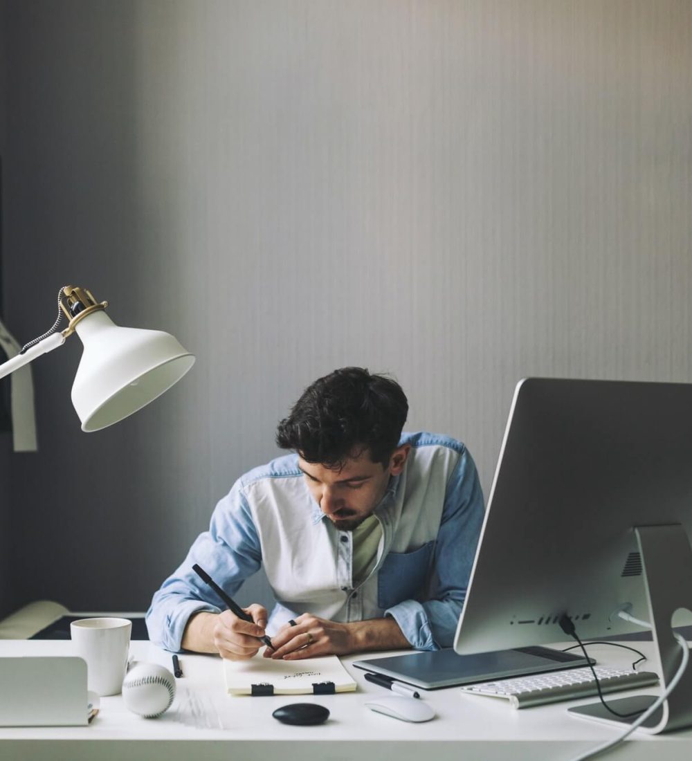 young-graphic-designer-working-in-office-1.jpg